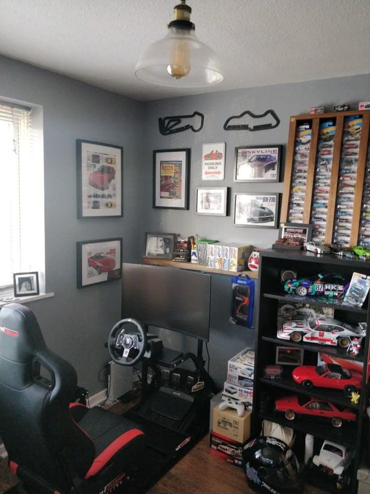 Sim racing man cave with gear and decor
